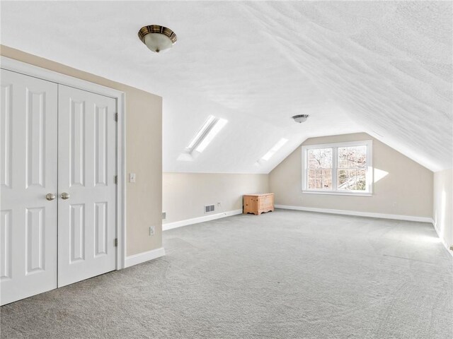 44 Azalea Ave, Exeter, RI 02822 - bonus room with carpet, baseboards, and lofted ceiling