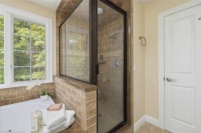 43 Kayla Ricci Way, Exeter, RI 02874 - full bathroom with a shower stall, healthy amount of natural light, a bath, and baseboards