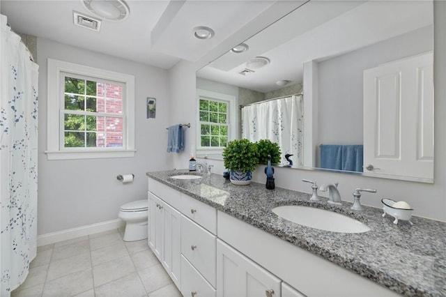 43 Kayla Ricci Way, Exeter, RI 02874 - bathroom with double vanity, baseboards, toilet, tile patterned floors, and curtained shower