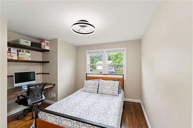 149 Weeden Dr, Warwick, RI 02818 - bedroom with dark wood-type flooring and baseboards