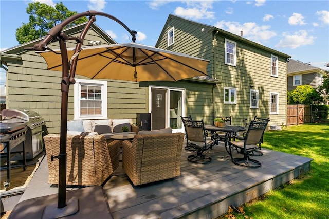 44 Felsmere Ave, Pawtucket, RI 02861 - rear view of house featuring a wooden deck, an outdoor living space, and outdoor dining space