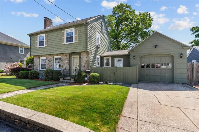 44 Felsmere Ave, Pawtucket, RI 02861 - colonial home with stone siding, a garage, driveway, a chimney, and a gate