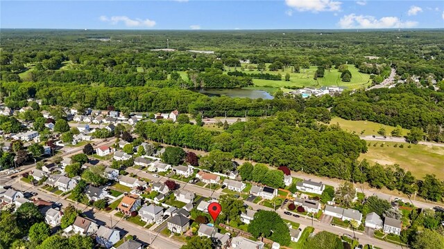 44 Felsmere Ave, Pawtucket, RI 02861 - aerial view of property and surrounding area featuring a nearby body of water, a heavily wooded area, and nearby suburban area