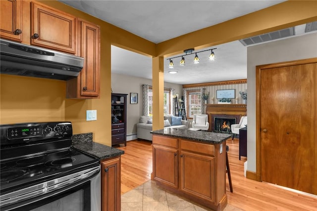 299 Buttonwoods Ave, Warwick, RI 02886 - kitchen with range with electric stovetop, range hood, open floor plan, and brown cabinets
