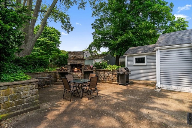 299 Buttonwoods Ave, Warwick, RI 02886 - view of patio / terrace with an outdoor stone fireplace, outdoor dining area, and a grill