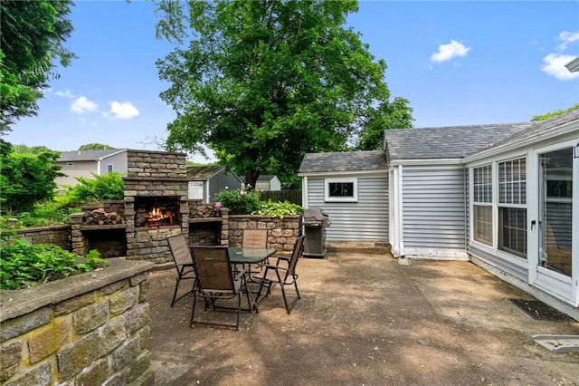 299 Buttonwoods Ave, Warwick, RI 02886 - view of patio / terrace with an outdoor stone fireplace, outdoor dining area, and a grill