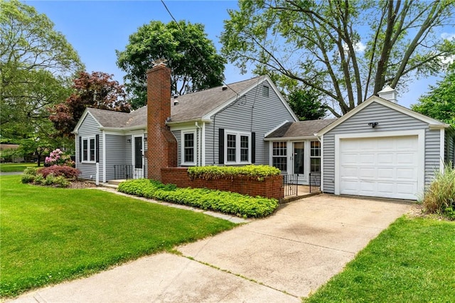 299 Buttonwoods Ave, Warwick, RI 02886 - view of front of property featuring a garage, a chimney, a front yard, driveway, and brick siding