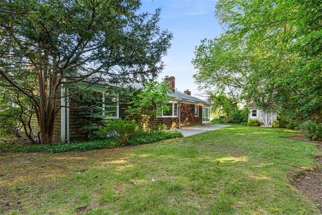 37 Beaumont St, East Providence, RI 02916 - view of green lawn featuring a patio