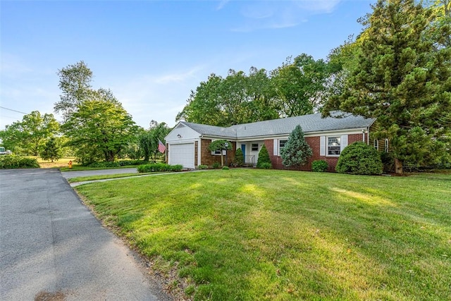 37 Beaumont St, East Providence, RI 02916 - single story home featuring a garage, a front lawn, brick siding, and driveway