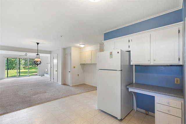 37 Beaumont St, East Providence, RI 02916 - kitchen featuring freestanding refrigerator, light carpet, open floor plan, baseboards, and white cabinetry