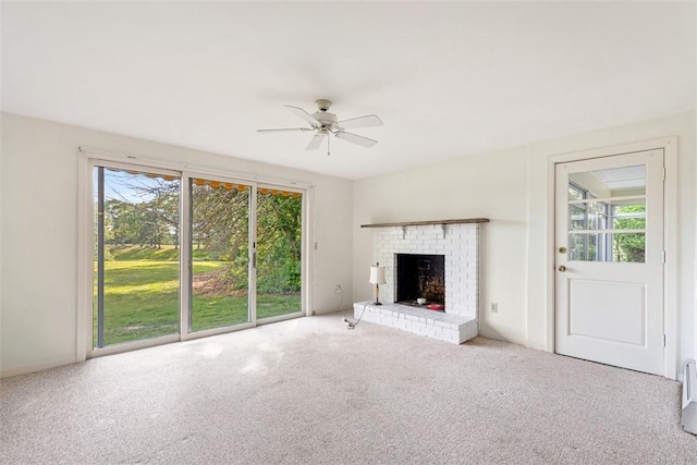 37 Beaumont St, East Providence, RI 02916 - unfurnished living room with carpet flooring, a ceiling fan, and a fireplace