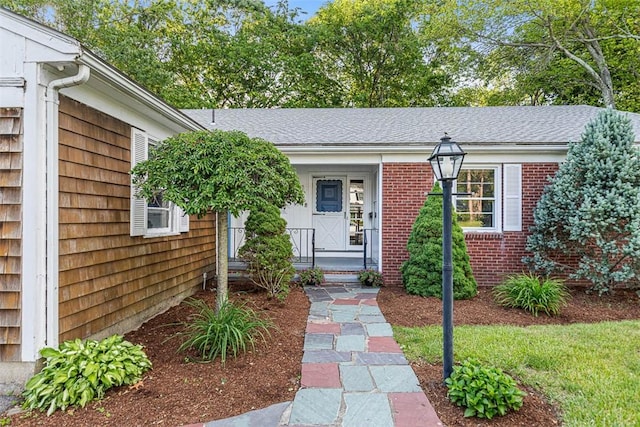 37 Beaumont St, East Providence, RI 02916 - doorway to property with brick siding