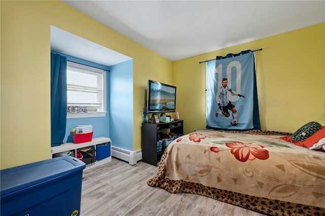 73 Vineyard Ave, Cumberland, RI 02864 - bedroom with baseboard heating and wood finished floors