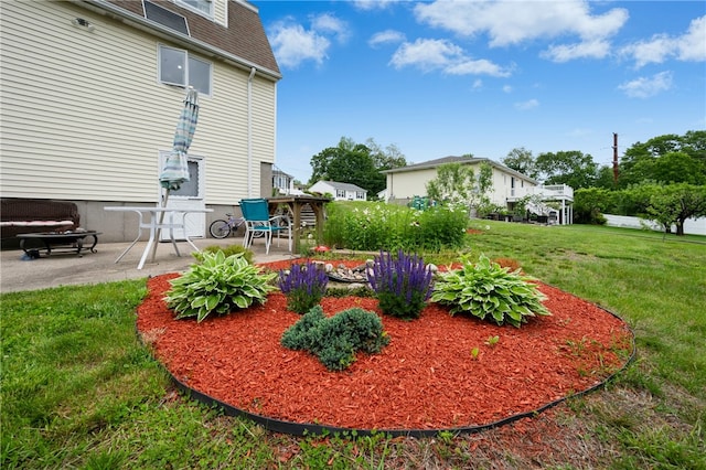 73 Vineyard Ave, Cumberland, RI 02864 - view of grassy yard with a patio