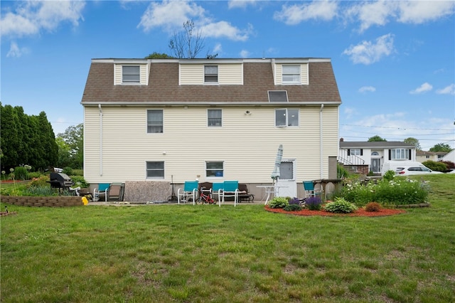 73 Vineyard Ave, Cumberland, RI 02864 - rear view of house featuring roof with shingles, a yard, and mansard roof