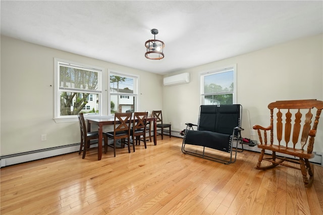 73 Vineyard Ave, Cumberland, RI 02864 - dining space with a wall mounted AC, healthy amount of natural light, and light wood-style floors