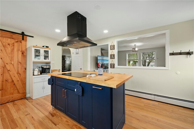 73 Vineyard Ave, Cumberland, RI 02864 - kitchen featuring island exhaust hood, blue cabinets, wood counters, black electric stovetop, and light wood-style flooring
