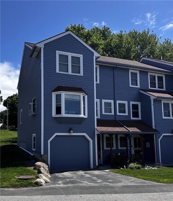 200 Heroux Blvd Unit 901, Cumberland, RI 02864 - view of front facade featuring covered porch, an attached garage, and asphalt driveway