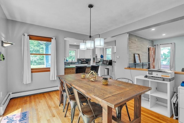 15 Boyd Ave, East Providence, RI 02914 - dining space with light wood-type flooring, recessed lighting, and baseboard heating