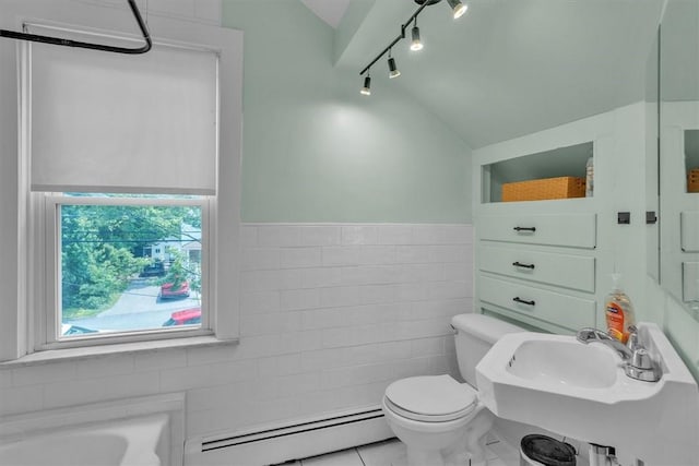 15 Boyd Ave, East Providence, RI 02914 - full bath with baseboard heating, tile walls, rail lighting, vaulted ceiling, and toilet