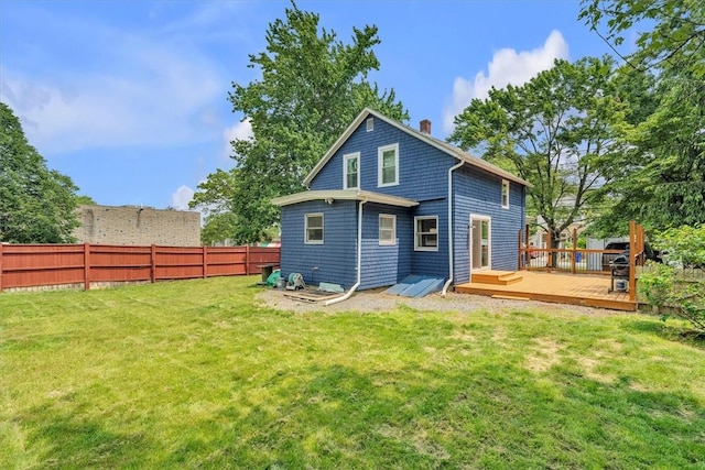 15 Boyd Ave, East Providence, RI 02914 - rear view of house featuring a deck and a chimney