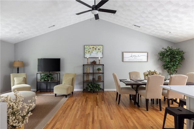 128 Old Quarry Rd, Glocester, RI 02857 - dining space featuring light wood finished floors, a ceiling fan, vaulted ceiling, and baseboards