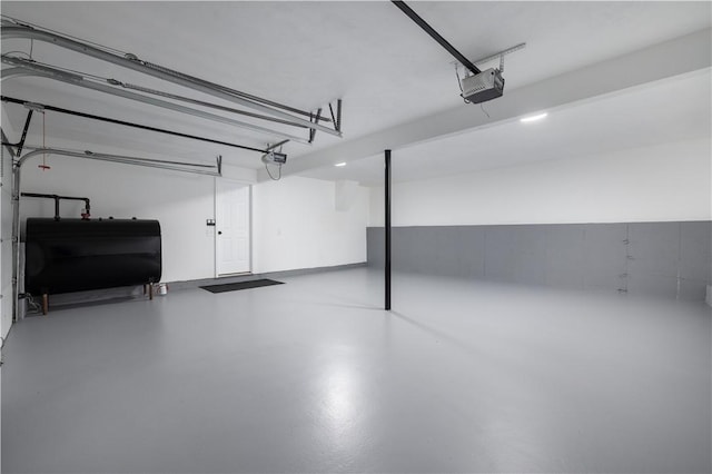 128 Old Quarry Rd, Glocester, RI 02857 - garage with oil tank and a garage door opener
