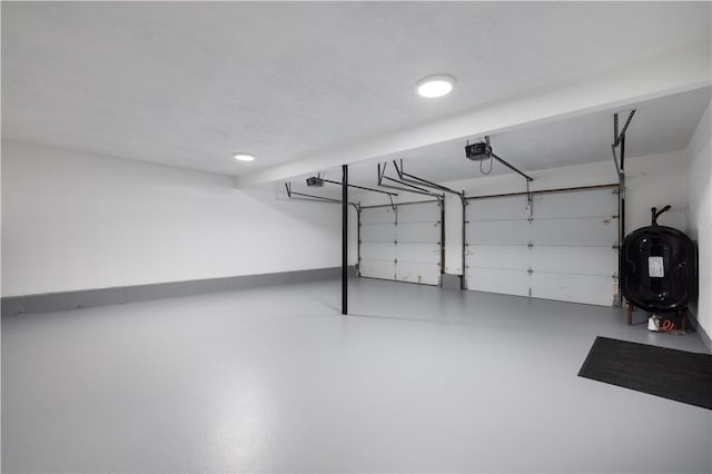 128 Old Quarry Rd, Glocester, RI 02857 - garage featuring oil tank and a garage door opener