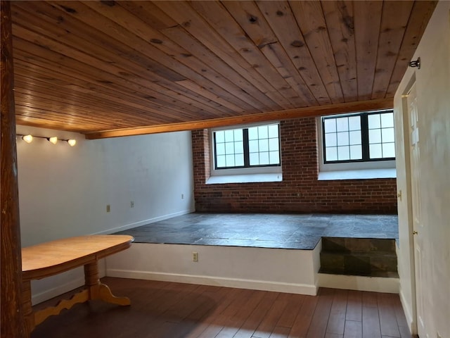 15 Higgins St Unit 106, Smithfield, RI 02917 - unfurnished room featuring wood ceiling, plenty of natural light, brick wall, and wood-type flooring