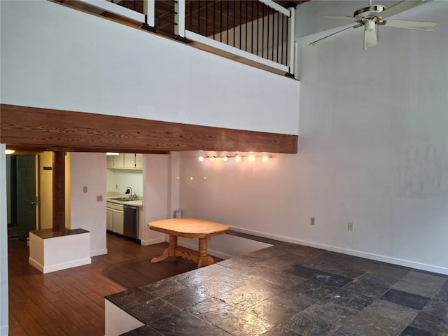 15 Higgins St Unit 106, Smithfield, RI 02917 - unfurnished living room with a high ceiling and a ceiling fan