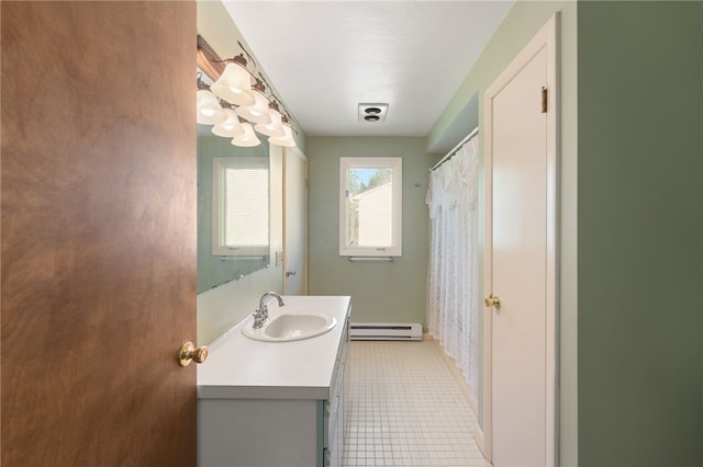 500 E Greenwich Ave Unit 108, West Warwick, RI 02893 - full bath featuring vanity, a baseboard radiator, tile patterned flooring, a shower with shower curtain, and baseboards