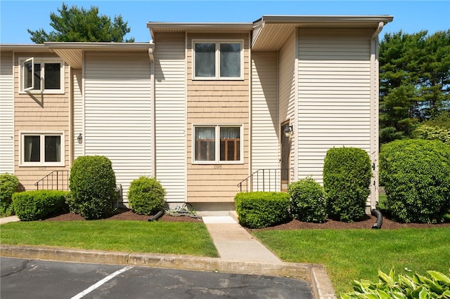 500 E Greenwich Ave Unit 108, West Warwick, RI 02893 - view of property featuring uncovered parking
