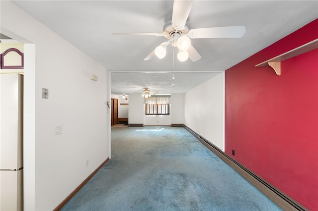 500 E Greenwich Ave Unit 108, West Warwick, RI 02893 - carpeted spare room featuring ceiling fan, baseboards, and a baseboard radiator
