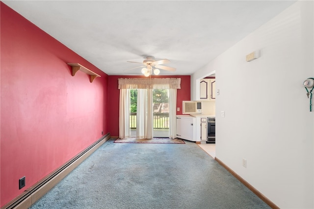 500 E Greenwich Ave Unit 108, West Warwick, RI 02893 - unfurnished living room with baseboard heating, ceiling fan, light carpet, and an AC wall unit