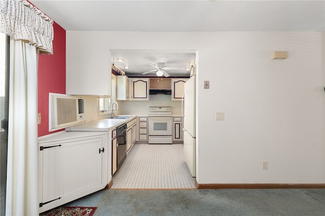 500 E Greenwich Ave Unit 108, West Warwick, RI 02893 - kitchen featuring white appliances, under cabinet range hood, ceiling fan, light carpet, and light countertops