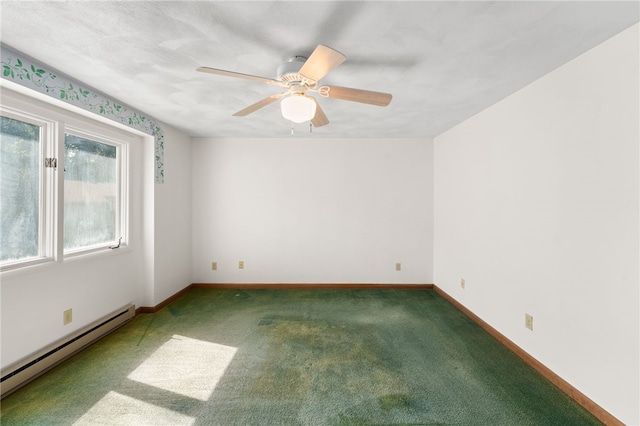 500 E Greenwich Ave Unit 108, West Warwick, RI 02893 - carpeted spare room featuring a baseboard heating unit, baseboards, and a ceiling fan