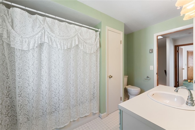 500 E Greenwich Ave Unit 108, West Warwick, RI 02893 - full bath featuring toilet, tile patterned floors, vanity, and a shower with curtain