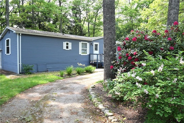 19 Jacob Perry Dr, Charlestown, RI 02831 - view of front of home with view of scattered trees