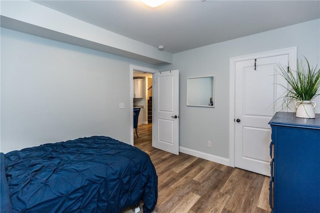 214 Silver Spring St, Providence, RI 02904 - bedroom featuring dark wood-style flooring and baseboards