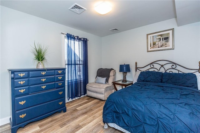 214 Silver Spring St, Providence, RI 02904 - bedroom with light wood-style flooring