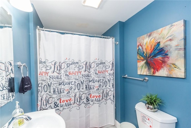 214 Silver Spring St, Providence, RI 02904 - bathroom featuring toilet, a sink, and a shower with curtain