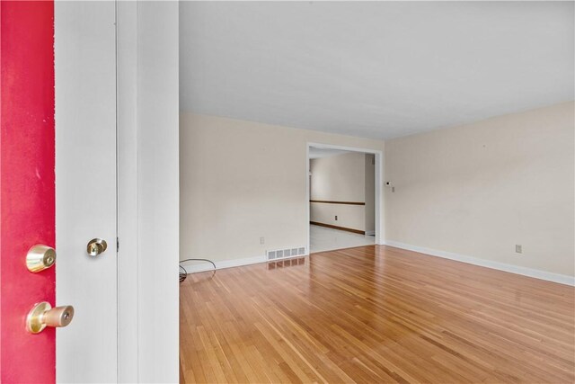 174 Russell Dr, Tiverton, RI 02878 - unfurnished room with wood finished floors and baseboards