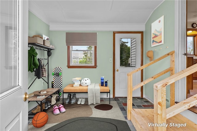 174 Russell Dr, Tiverton, RI 02878 - entryway with healthy amount of natural light, stairway, and ornamental molding