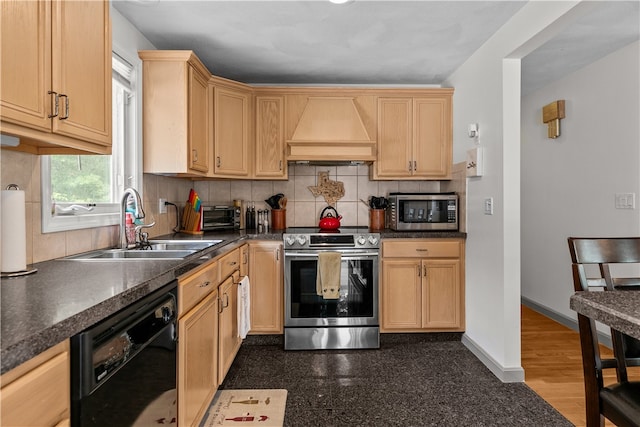 386 Mishnock Rd, West Greenwich, RI 02817 - kitchen with stainless steel appliances, premium range hood, a sink, tasteful backsplash, and dark countertops