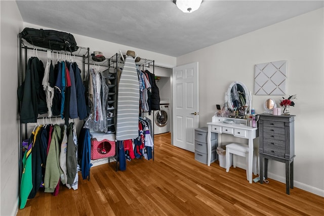 386 Mishnock Rd, West Greenwich, RI 02817 - walk in closet featuring wood finished floors and washer / clothes dryer