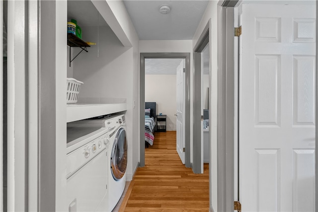 386 Mishnock Rd, West Greenwich, RI 02817 - laundry area featuring light wood finished floors and washer and dryer