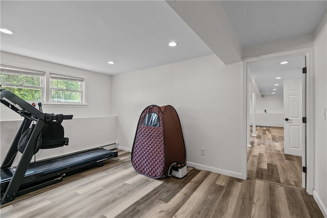 386 Mishnock Rd, West Greenwich, RI 02817 - workout area with wood finished floors, recessed lighting, and baseboards