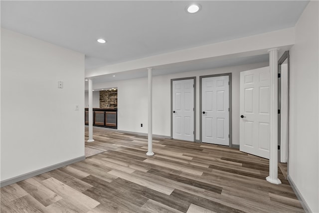 386 Mishnock Rd, West Greenwich, RI 02817 - finished basement with recessed lighting, wood finished floors, and baseboards