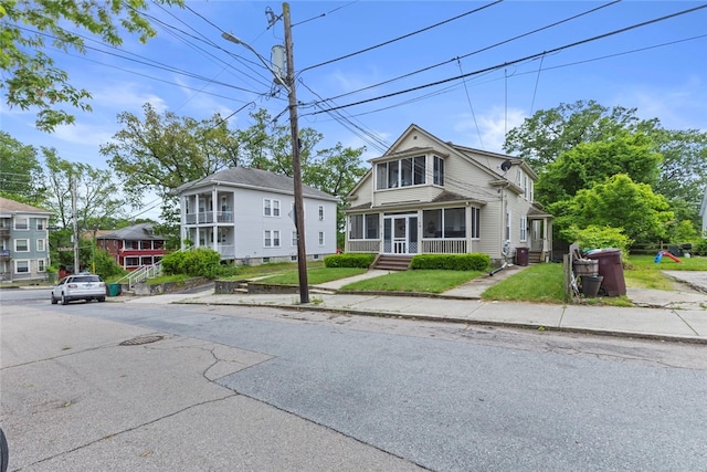 20 Cold Spring Pl, Woonsocket, RI 02895 - view of front of house with a sunroom