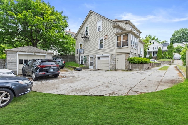 20 Cold Spring Pl, Woonsocket, RI 02895 - view of home's exterior with stone siding, driveway, and an attached garage
